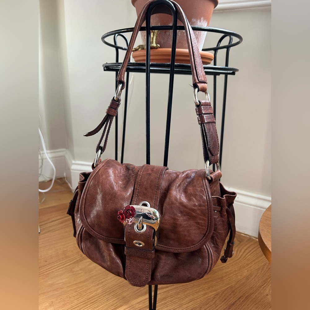 Miu Miu brown leather buckle flap shoulder bag with tiny rose detail